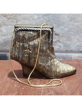 Raine Willits Designs Just The Right Style Boot Music Box Putting on the